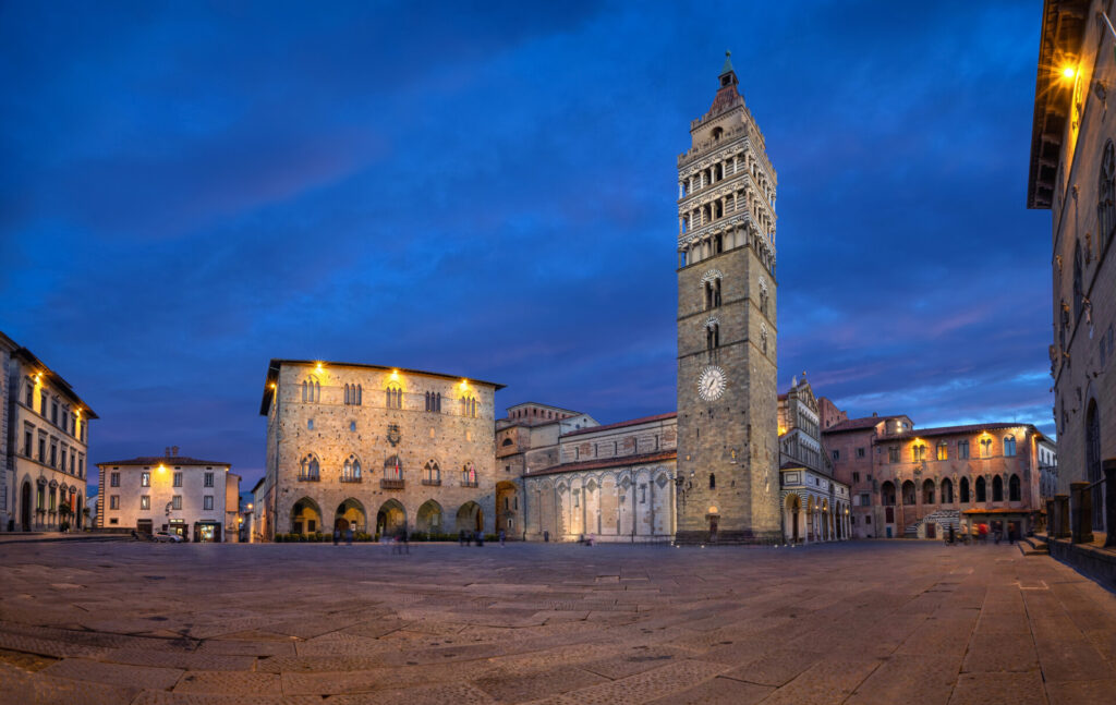 Pistoia, Italy. Panorama of Piazza del Duomo square with old Town Hall and Cathedral of San Zeno at dusk with HDR-effect