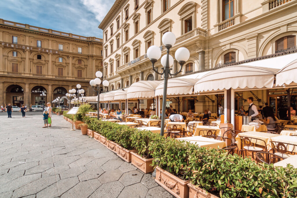 Summer street cafe on Piazza della Repubblica in Florence, Toscana province, Italy.
