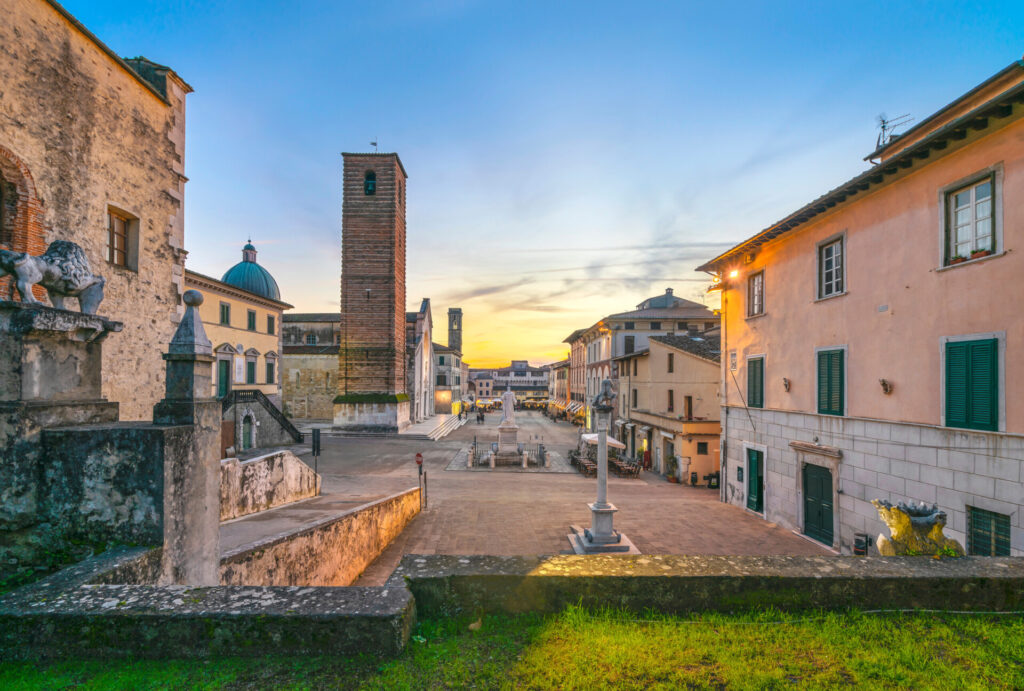 Pietrasanta old town view at sunset, San Martino cathedral and torre civica. Versilia Lucca Tuscany Italy Europe