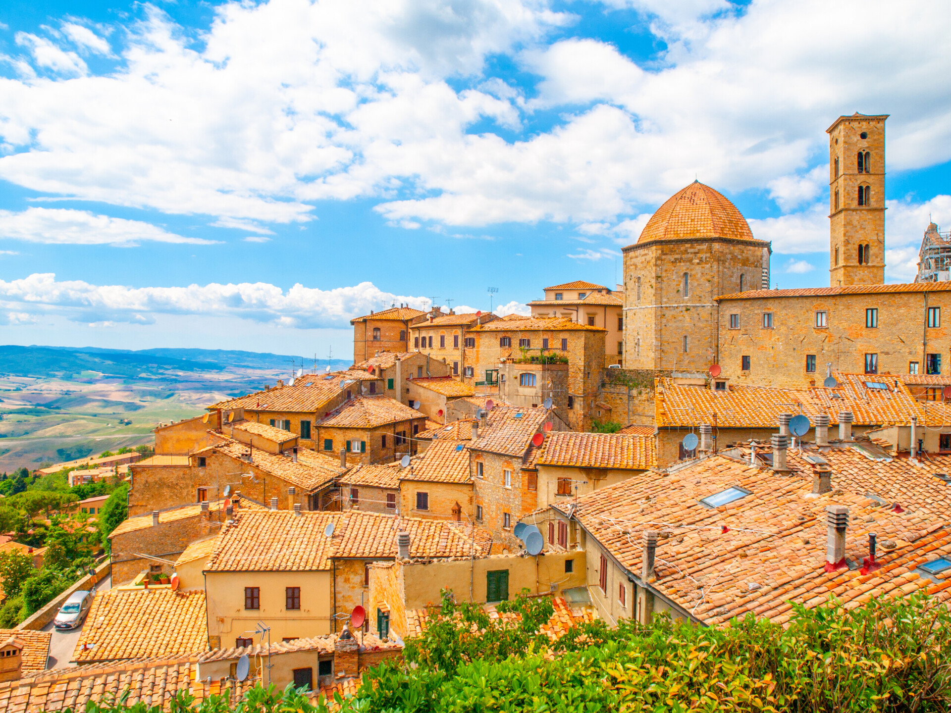 Panoramic view of Volterra - medieval Tuscan town with old houses, towers and churches, Tuscany, Italy.