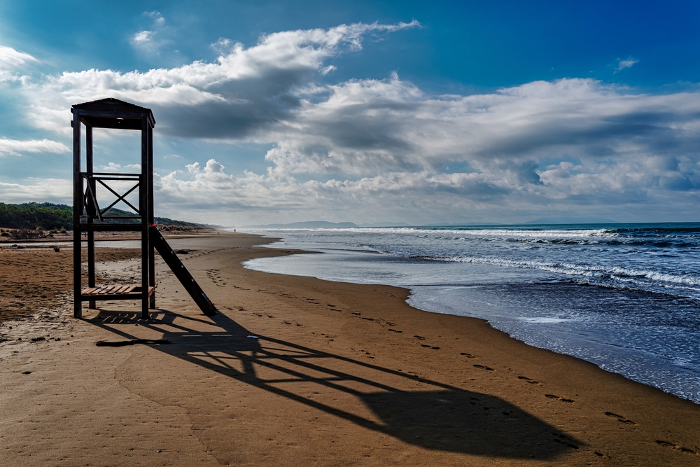 In the foreground the structure used by lifeguards on the beach of Marina di Castagneto Carducci Tuscany Italy