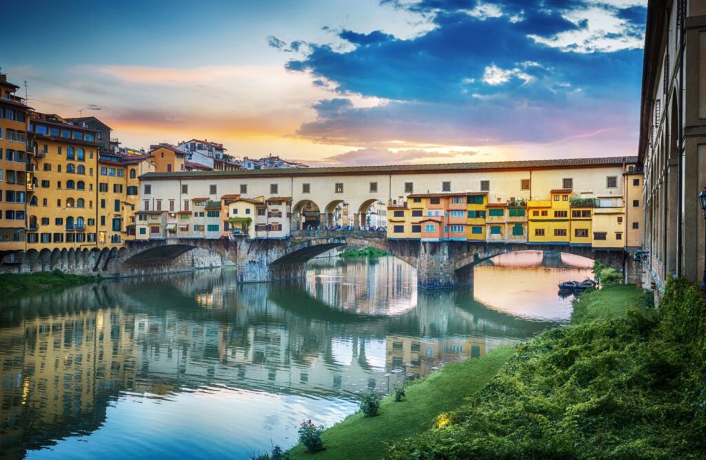 Famous bridge Ponte Vecchio on the river Arno in Florence, Italy. Evening view.